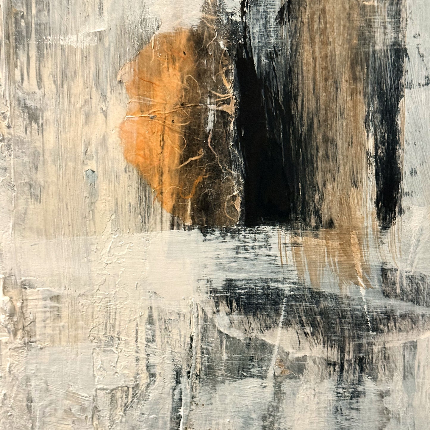 Abstract art with orange, black, and gray brush strokes on a textured surface