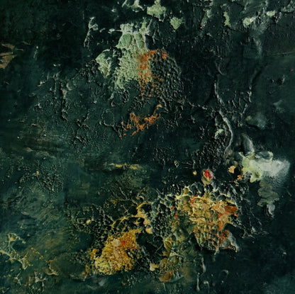 Close-up of a textured surface with orange and gray colors