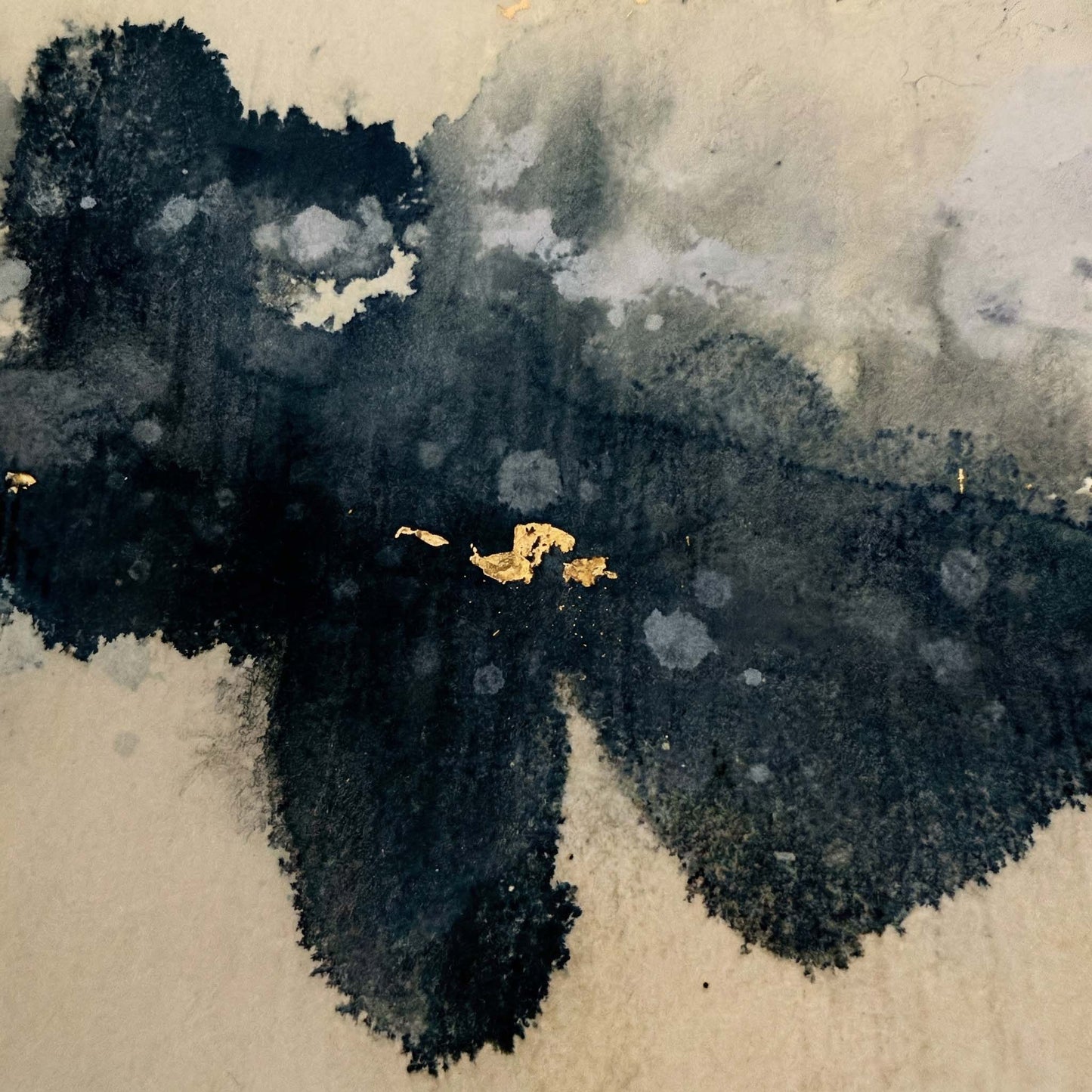 Abstract art with black and white brush strokes on a textured beige background