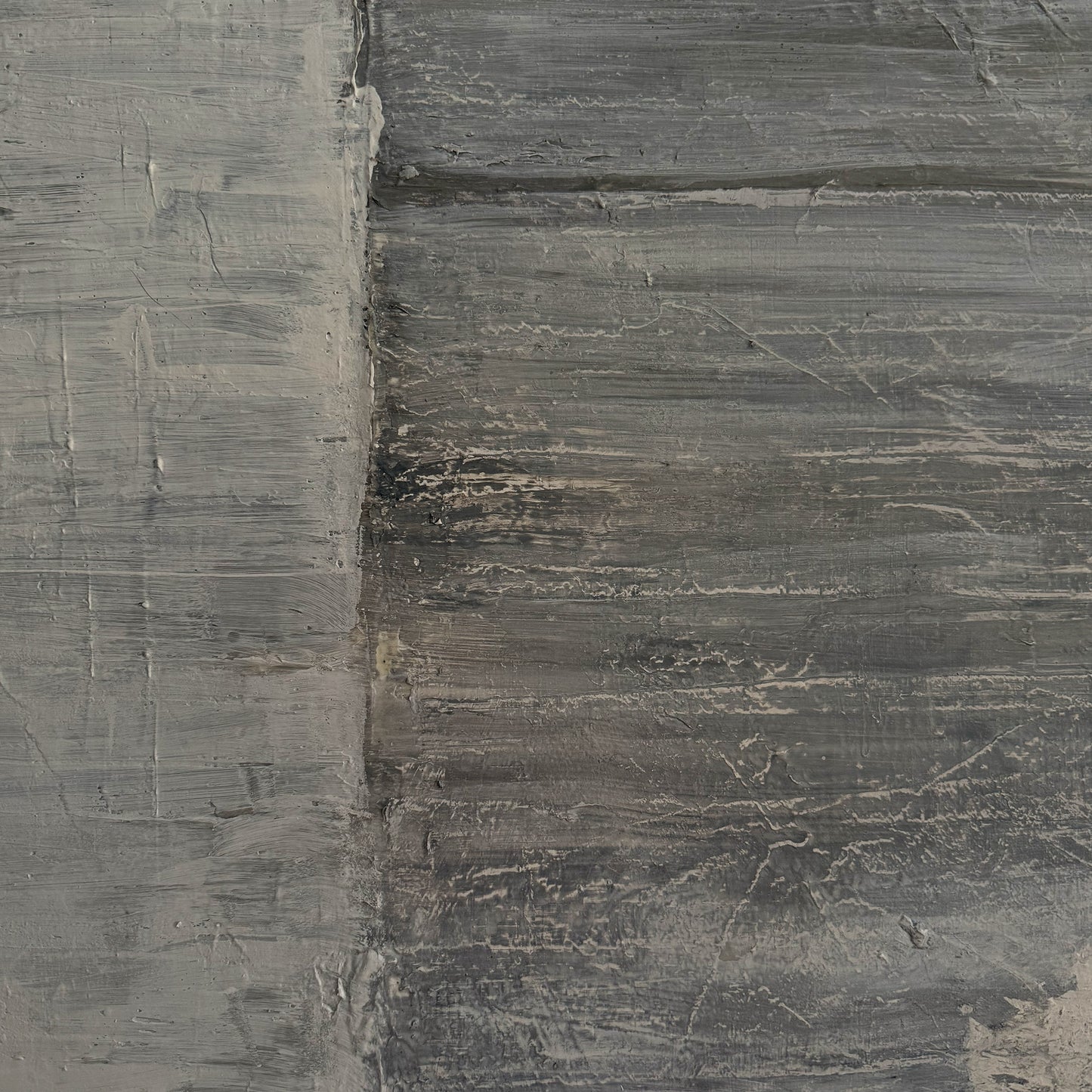 Close-up of a textured gray stone surface