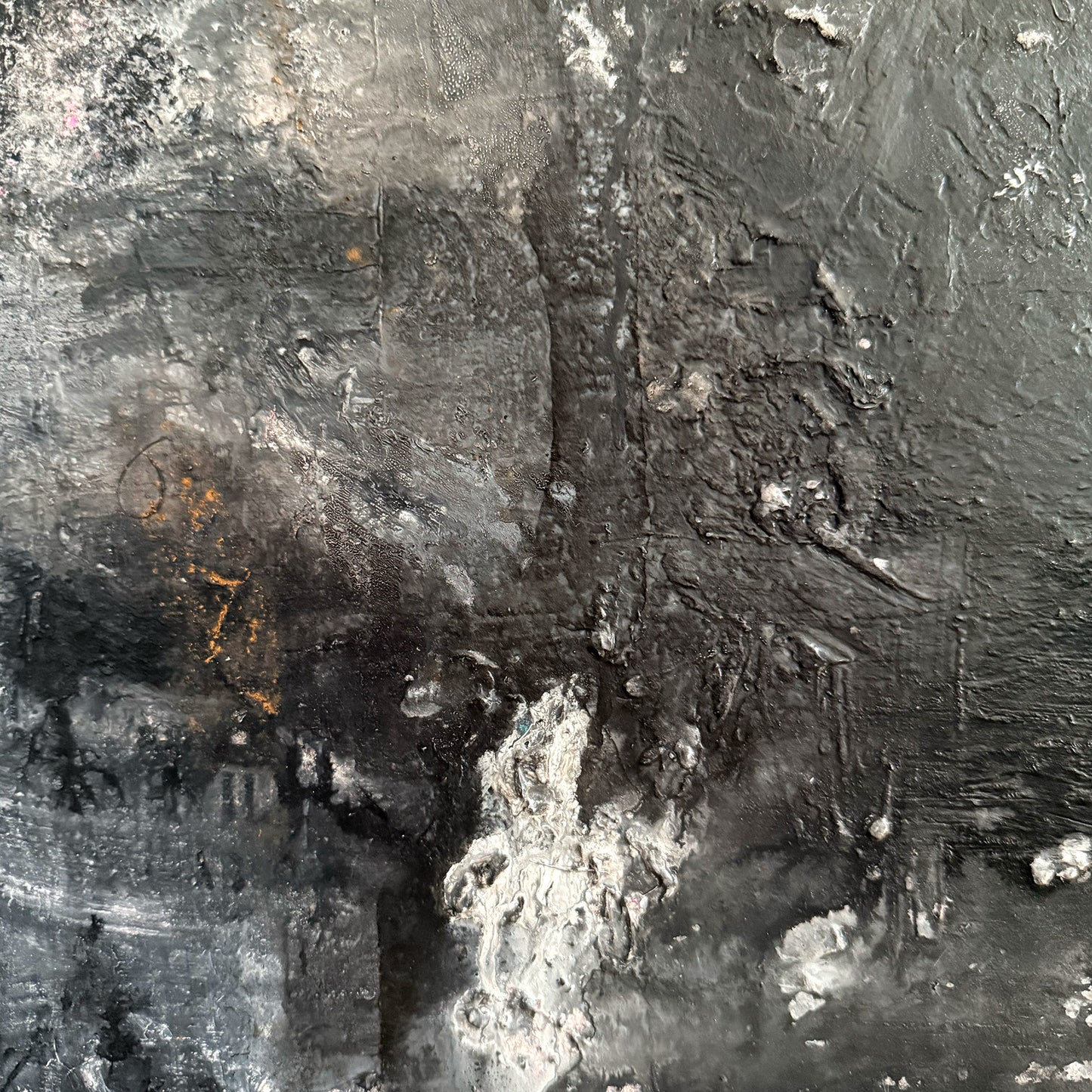 Close-up of an abstract black and white painting with textured surface