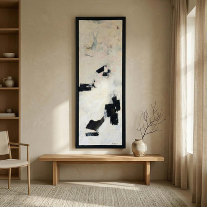Abstract painting on a wall in a room with a wooden bench and chair.