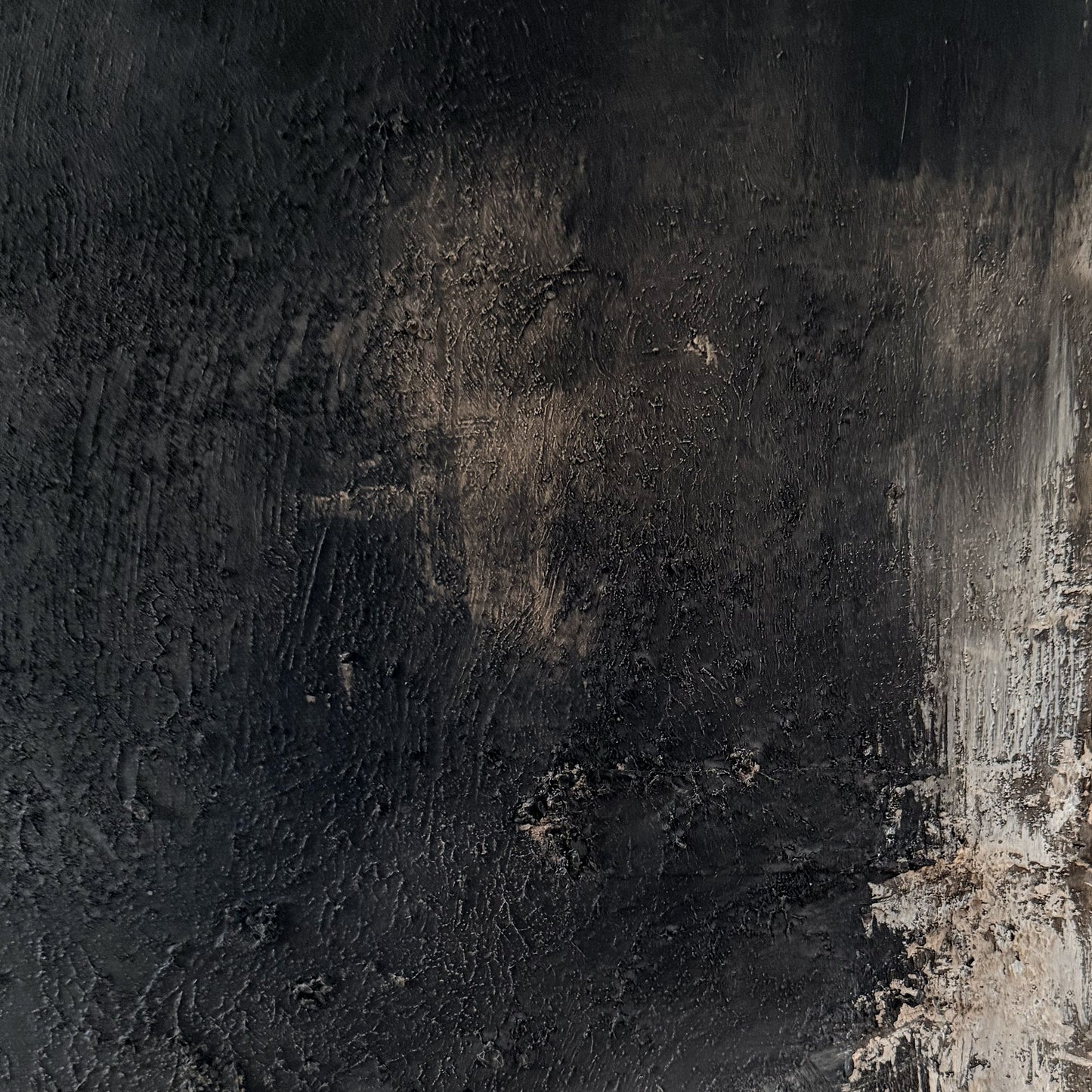 Textured black and brown surface with a rough texture
