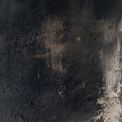 Textured black and brown surface with a rough texture