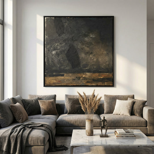 Modern living room with a gray sectional sofa, abstract painting, and decorative items.