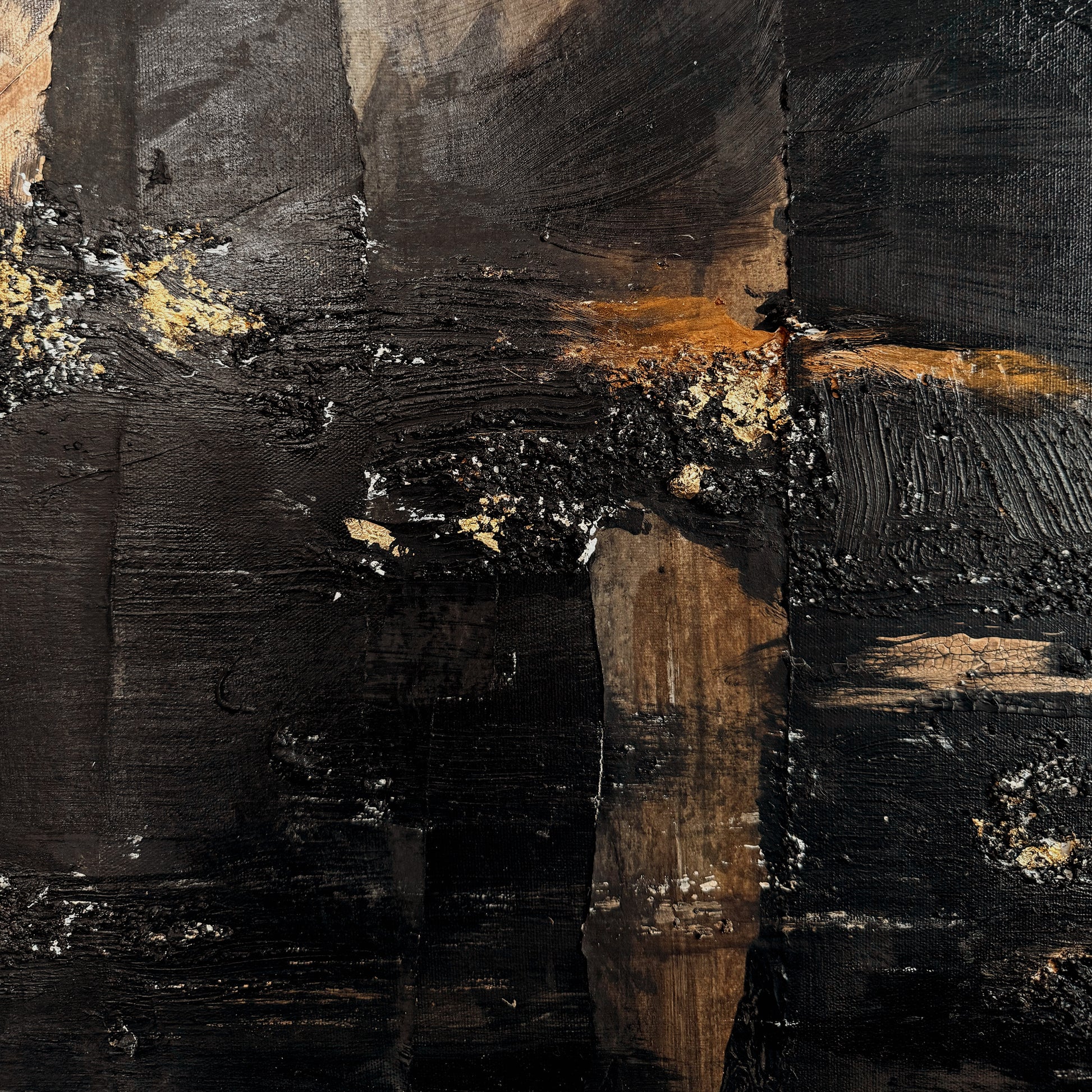 Abstract art with black, brown, and gold colors