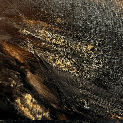 Close-up of textured dark surface with brown and black colors
