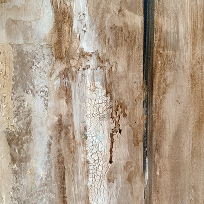Close-up of a textured wall with horizontal lines and cracks.