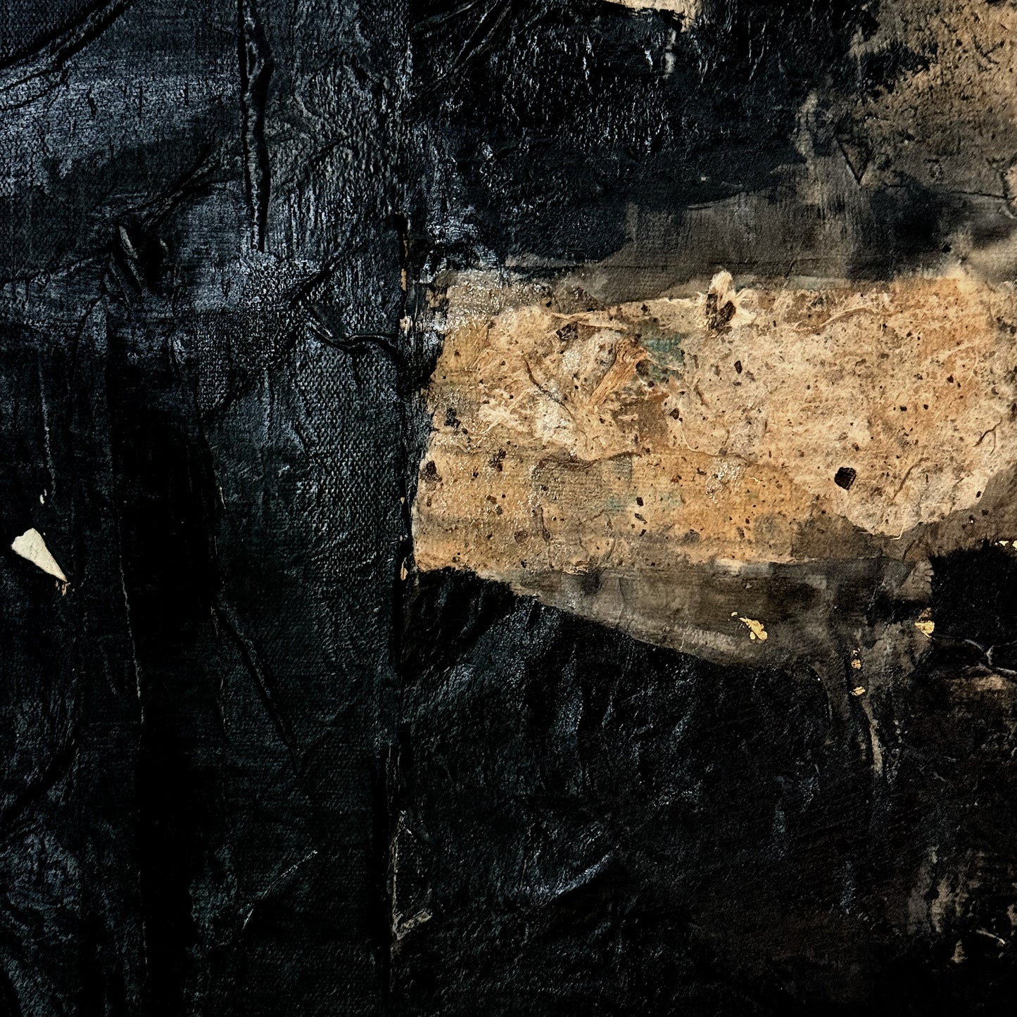 Abstract art with textured black and brown elements